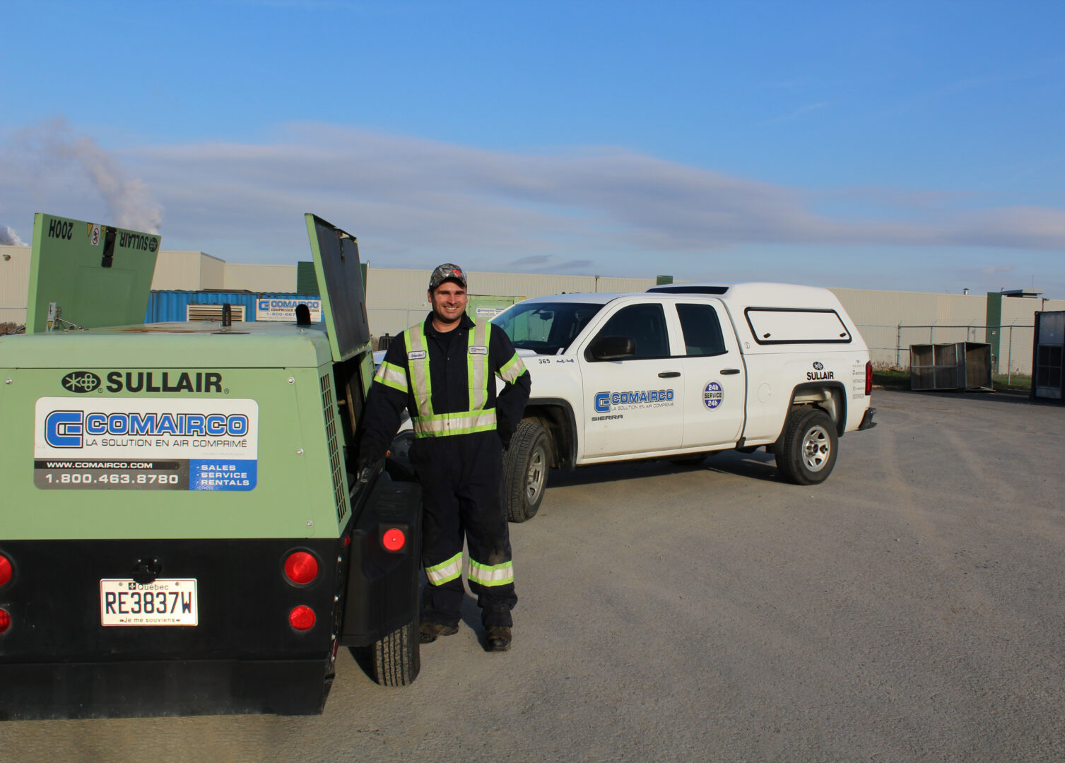Technician with portable air compressor